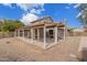 The backyard patio provides ample space for seating and outdoor gatherings, surrounded by a low-maintenance yard at 6533 E Beverly Ln, Scottsdale, AZ 85254