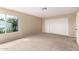 Spacious bedroom with large closet and bright window for natural light at 6533 E Beverly Ln, Scottsdale, AZ 85254