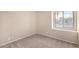 Bedroom with neutral carpet and natural light from a bright window at 6533 E Beverly Ln, Scottsdale, AZ 85254