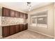 Inviting dining area featuring tile floors, neutral walls, and lots of natural light from the window at 6533 E Beverly Ln, Scottsdale, AZ 85254