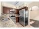 Kitchen with stainless appliances, granite countertop, tile backsplash, and lots of light at 6533 E Beverly Ln, Scottsdale, AZ 85254