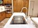 Close up view of the large kitchen sink and quartz countertops, highlighting the space at 6841 N 3Rd Pl, Phoenix, AZ 85012