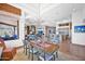 The dining room flows into the living room and eat-in kitchen, with access to the patio at 8154 E Tecolote Cir, Scottsdale, AZ 85266