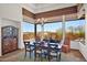 Bright dining room with large windows and scenic views at 8154 E Tecolote Cir, Scottsdale, AZ 85266