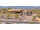 A close up view of the home with desert landscaping and native vegetation at 8154 E Tecolote Cir, Scottsdale, AZ 85266