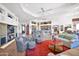 Spacious living room featuring a kitchen bar, comfortable seating, and beautiful Southwest decor at 8154 E Tecolote Cir, Scottsdale, AZ 85266