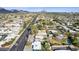 Wide aerial shot of property highlighting proximity to thoroughfare and views of Camelback Mountain at 1009 E Bethany Home Rd, Phoenix, AZ 85014