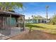 Landscaped backyard with a gazebo and a view of the home's exterior at 1009 E Bethany Home Rd, Phoenix, AZ 85014