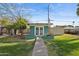 Backyard studio/flex-space with modern French doors and desert landscaping at 1009 E Bethany Home Rd, Phoenix, AZ 85014