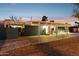 Stylish home with a covered driveway and charming front yard at 1009 E Bethany Home Rd, Phoenix, AZ 85014