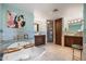 Elegant main bathroom featuring a soaking tub, dual vanities, and a glass-enclosed shower at 1040 E Osborn Rd # 1801, Phoenix, AZ 85014