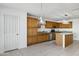 Kitchen featuring wood cabinets, granite counters, and stainless steel appliances at 10520 W Patrick Ln, Peoria, AZ 85383