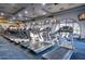 Well-equipped gym with treadmills and televisions for an optimal workout experience at 12820 W La Vina Dr, Sun City West, AZ 85375