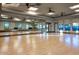 Bright dance studio featuring wood floors, mirrors, and ample natural light at 12820 W La Vina Dr, Sun City West, AZ 85375