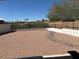 Large and spacious desert backyard with a rock wall at 14240 N Ibsen Dr # B, Fountain Hills, AZ 85268