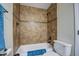 Bright bathroom featuring a tiled shower and tub combination with modern fixtures at 150 N Lakeview Blvd # 1, Chandler, AZ 85225