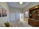 Bedroom featuring neutral walls and carpet, complemented by a custom built-in wood cabinet at 150 N Lakeview Blvd # 1, Chandler, AZ 85225