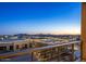 Picturesque balcony view of the city skyline and distant mountains at dusk at 15215 N Kierland Blvd # 633, Scottsdale, AZ 85254