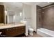 Bathroom featuring a vanity, shower, and toilet with modern fixtures at 15215 N Kierland Blvd # 633, Scottsdale, AZ 85254