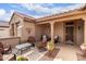 Relaxing porch featuring comfortable outdoor seating, ideal for enjoying the fresh air at 15850 W Silver Breeze Dr, Surprise, AZ 85374