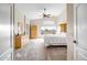 Bright main bedroom featuring vaulted ceiling, large window, carpet floors, and ample built-in storage at 16388 N 99Th Pl, Scottsdale, AZ 85260