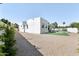 Modern home featuring a xeriscaped yard, pool, and sleek architectural details at 16409 N 62Nd Way, Scottsdale, AZ 85254