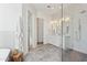 Spa-like bathroom features a glass enclosed shower, double vanity, and elegant tile flooring at 16409 N 62Nd Way, Scottsdale, AZ 85254