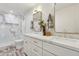 Modern bathroom featuring a glass shower, framed mirror and ample vanity storage at 16409 N 62Nd Way, Scottsdale, AZ 85254