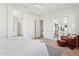 Bright and spacious main bedroom boasts neutral tones and a sliding door to outdoor area at 16409 N 62Nd Way, Scottsdale, AZ 85254