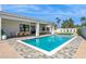 Inviting backyard oasis featuring a sparkling pool, covered patio with dining, and well manicured landscaping at 16409 N 62Nd Way, Scottsdale, AZ 85254