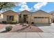 Charming single-story home with desert landscaping, a two-car garage, and a covered entry at 16617 S 16Th Ave, Phoenix, AZ 85045