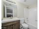 Bathroom features a single sink vanity and a shower-tub combination at 18823 N 41St Dr, Glendale, AZ 85308