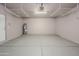 Clean, spacious garage with overhead racks and ample storage space at 18823 N 41St Dr, Glendale, AZ 85308