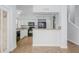 Bright kitchen features tile flooring, granite countertops, and white cabinetry at 18823 N 41St Dr, Glendale, AZ 85308