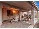 Covered back patio with brick flooring offering a shaded outdoor living space at 1939 S Noble --, Mesa, AZ 85209