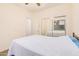 Bright bedroom featuring plush carpet, mirrored closet, and natural lighting at 1939 S Noble --, Mesa, AZ 85209