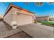 Attractive single-Gathering home featuring a large garage and paved driveway at 1939 S Noble --, Mesa, AZ 85209