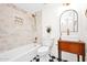 Elegant bathroom with marble tile, vintage vanity, and a modern vessel sink at 19450 E Silver Creek Ln, Queen Creek, AZ 85142