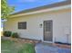 Neutral exterior of the additional dwelling unit featuring a private entrance and well-kept landscaping at 19450 E Silver Creek Ln, Queen Creek, AZ 85142