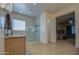 Spacious bathroom with a glass-enclosed shower and granite-topped vanity at 21186 E Sunset Dr, Queen Creek, AZ 85142