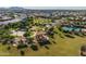 Aerial view of community playground with picnic areas and walking trails, nestled among homes at 21512 S 225Th Way, Queen Creek, AZ 85142