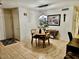 Cozy dining area filled with natural light from the front door at 2251 E Parkside Ln, Phoenix, AZ 85024