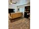 View of the living room featuring a flat-screen TV and neutral colored walls at 2251 E Parkside Ln, Phoenix, AZ 85024