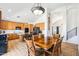 An inviting dining area featuring an archway to an open-concept kitchen at 2678 E Firestone Dr, Chandler, AZ 85249