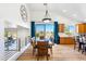 Bright dining area with wood floors, vaulted ceilings, and natural light at 2678 E Firestone Dr, Chandler, AZ 85249