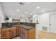 Basement wet bar with tile countertops, wood cabinets, and recessed lighting at 2678 E Firestone Dr, Chandler, AZ 85249