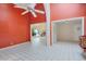 Inviting living room with colorful walls, tile flooring, and unique archways at 3022 E Weldon Ave, Phoenix, AZ 85016