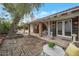 Charming outdoor patio with brick accents and covered seating area at 3022 E Weldon Ave, Phoenix, AZ 85016