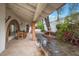 Inviting covered patio with stone flooring, and fountain feature at 3022 E Weldon Ave, Phoenix, AZ 85016