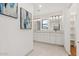 Bright bathroom featuring double vanity, white cabinetry and modern light fixtures at 309 W Campbell Ave, Phoenix, AZ 85013